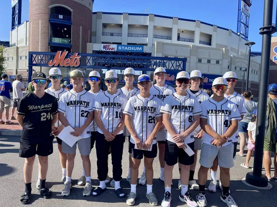 A Warpath team outside a ballpark
