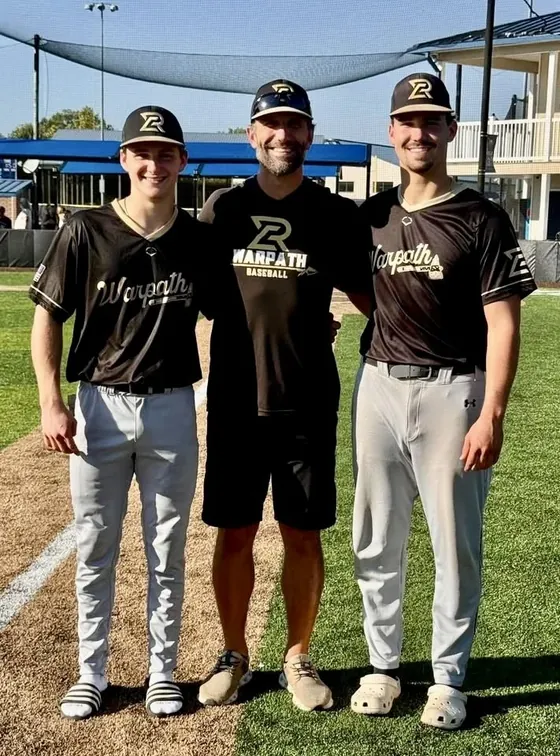 Russ Canzler with two Warpath players